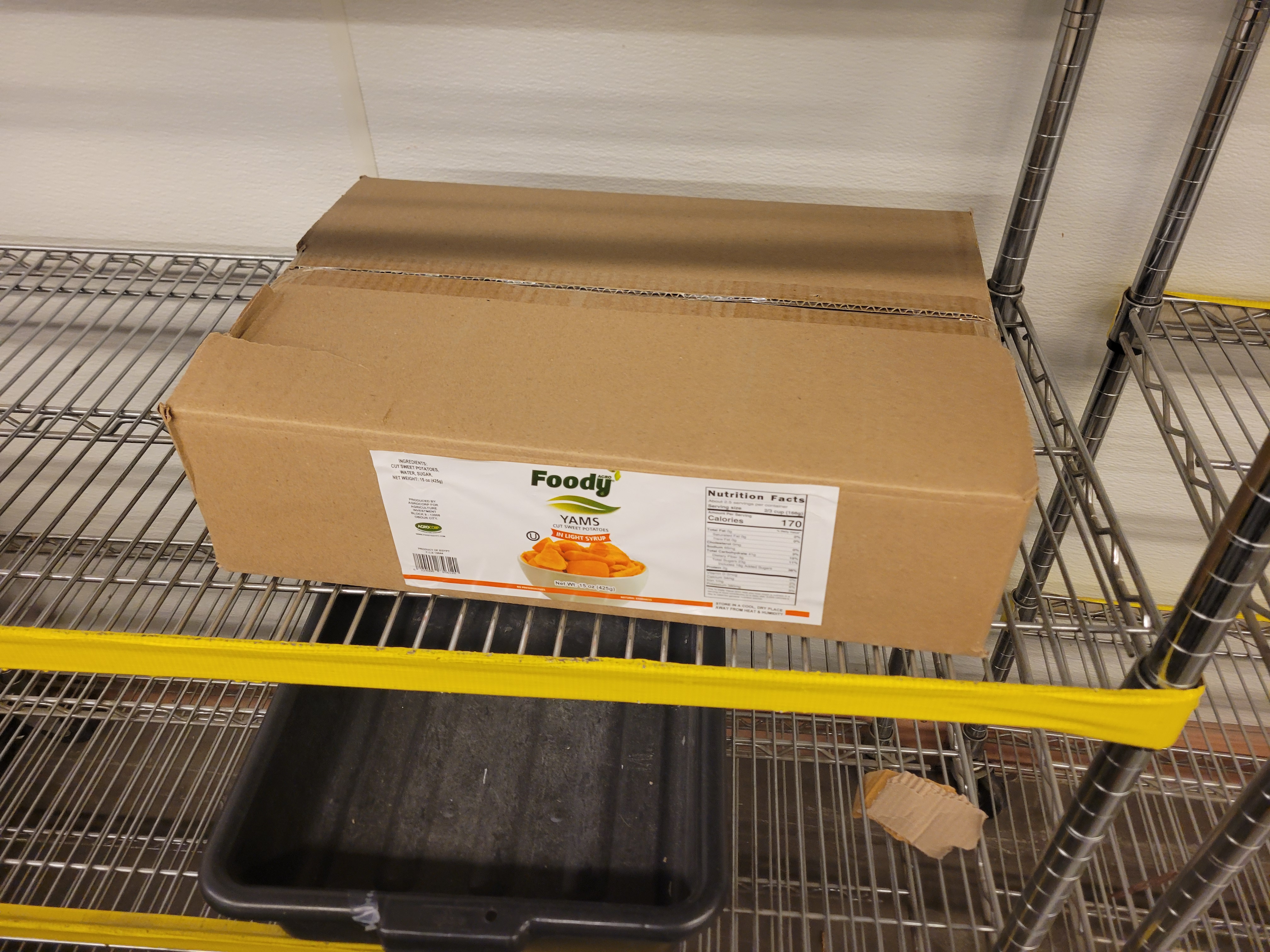Box of canned yams.